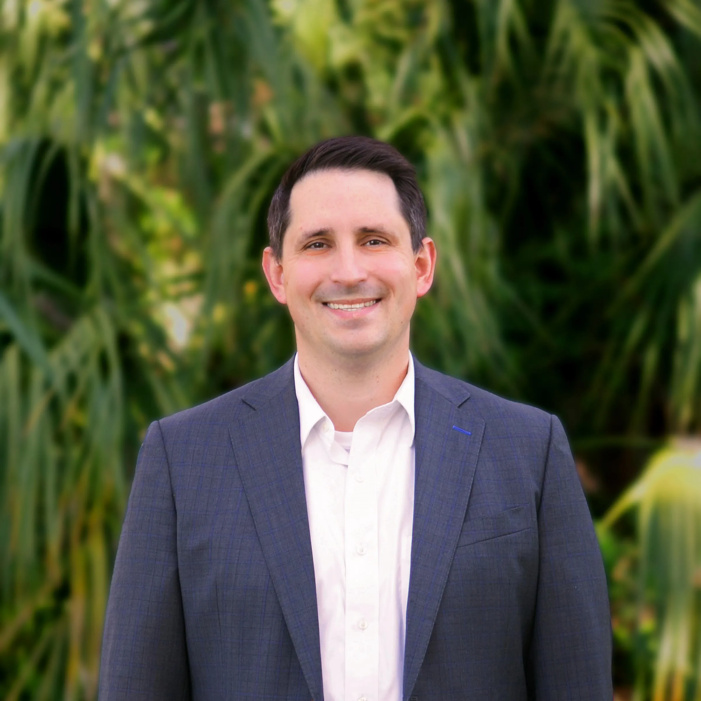 male legal professional posing for a photo
