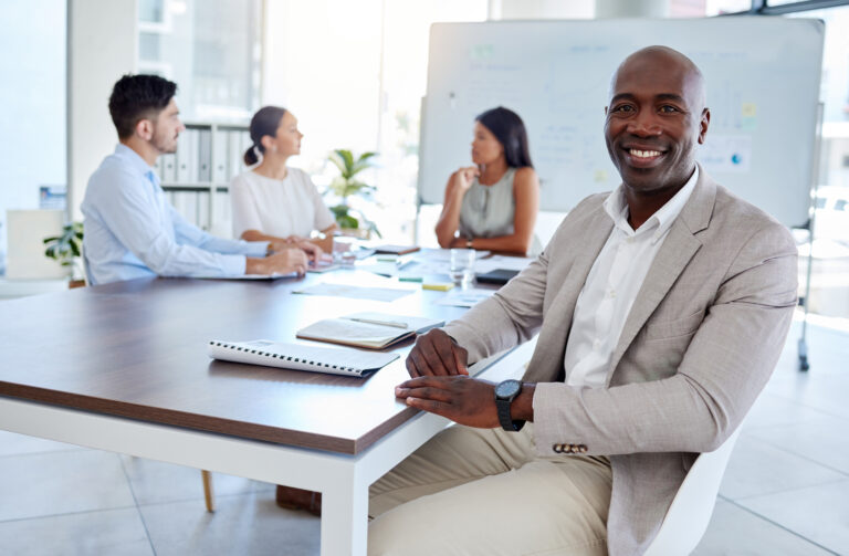 legal professionals around a meeting table
