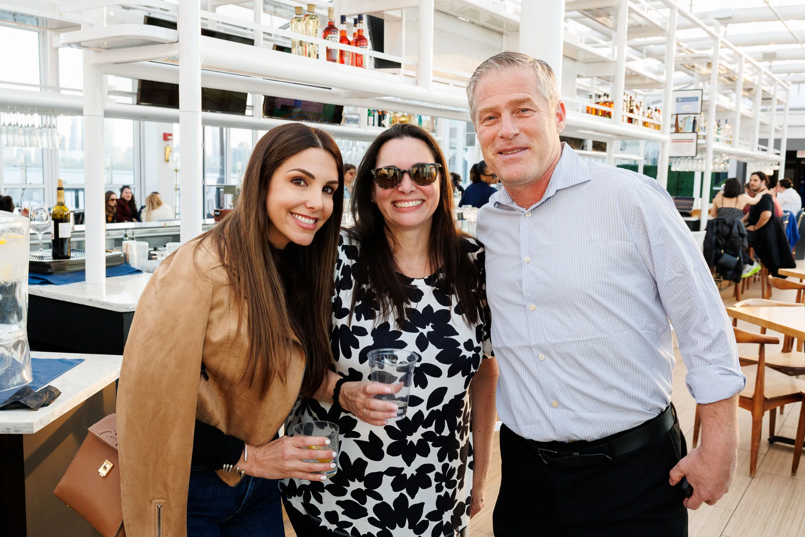 Giselle Maranges, Cynthia Cutler Moon, and Andrew Cary smiling for a photo.
