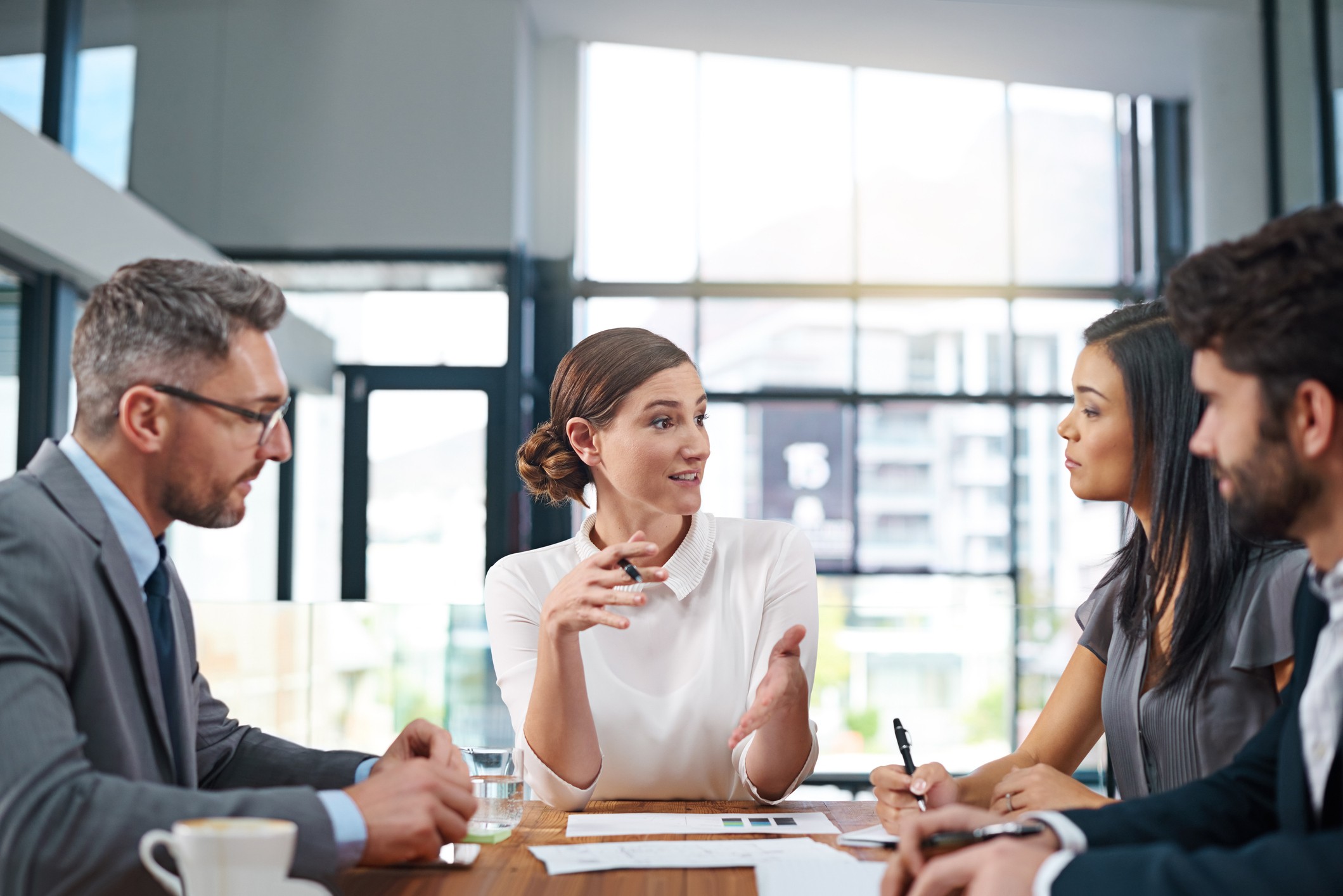 Photo of a group of businesspeople meeting in the boardroom